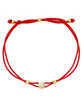 Bransoletka złote kółko z centralnym kamykiem na czerwonym sznurku