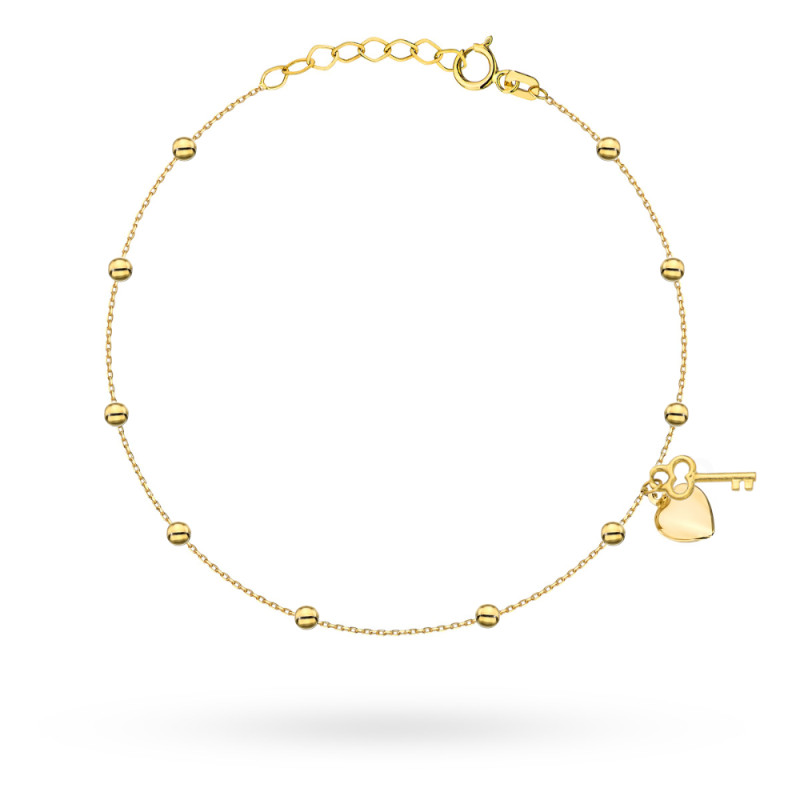 Bransoletka złota z gładkimi kulkami i serce z kluczykiem